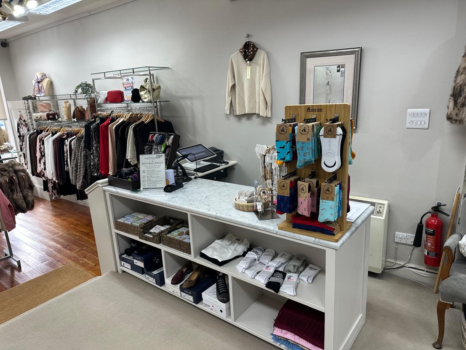 The till and display counter at Well Heeled Boutique